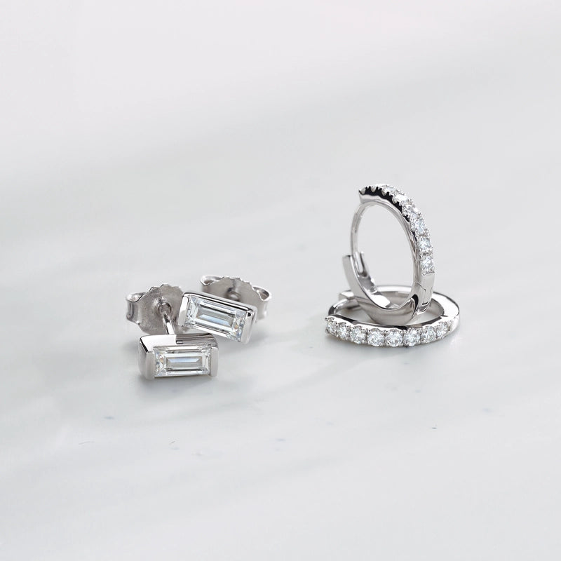 white gold baguette stud earrings with white gold round diamond huggie hoop earrings